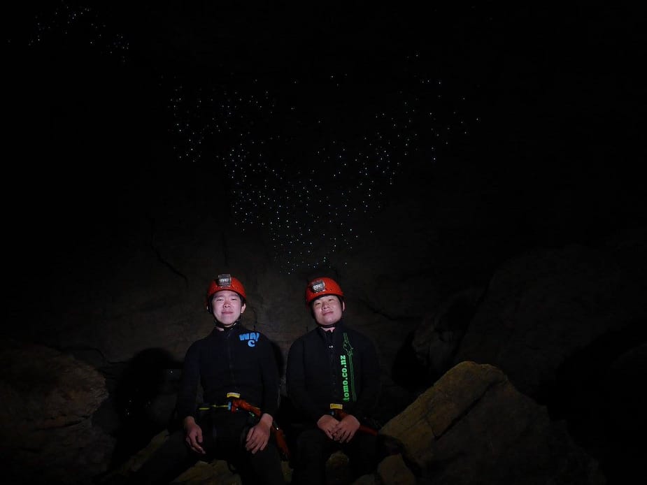 Posing with the glowworms in New Zealand