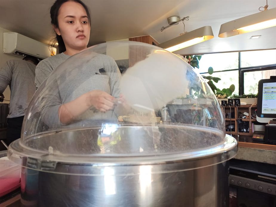 Girl making cotton candy
