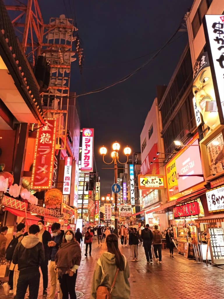 Street with bright signboards in Dotobori, Japan