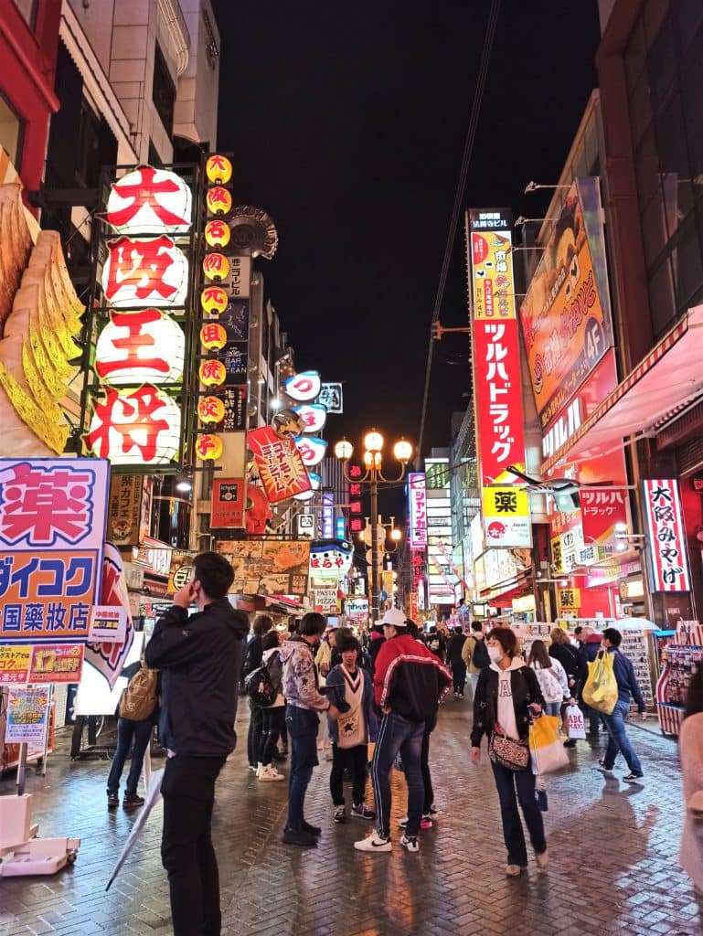 Street with bright signboards in Dotobori, Japan